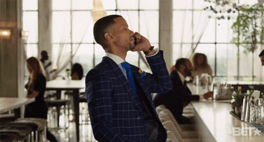 Life Saver Man Talking On The Phone GIF