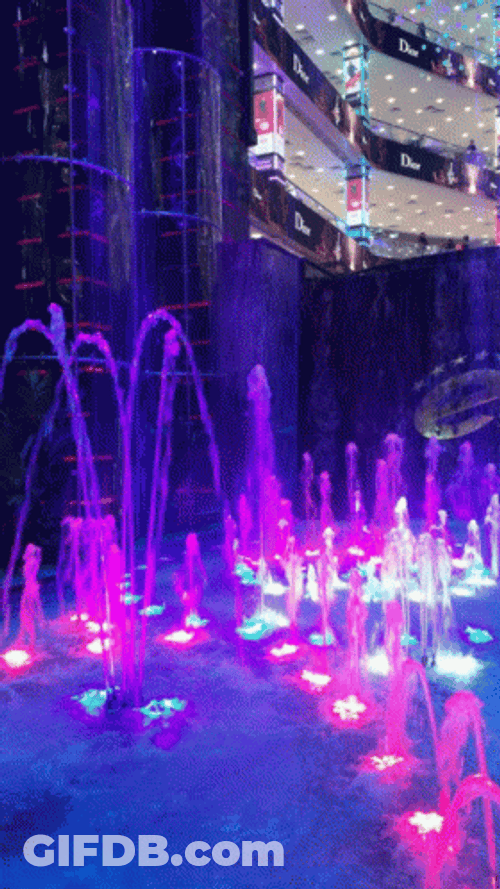 Light Purple Neon Fountain GIF