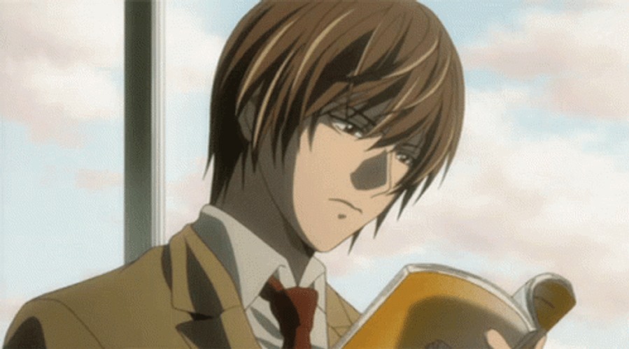 Light Yagami Reading A Book GIF