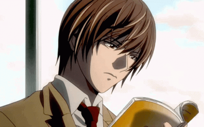 Light Yagami Scanning A Book GIF