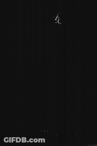 Lightning Bolt Strikes Against Dark Sky GIF