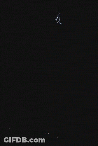 Lightning Bolt Strikes Night Sky GIF