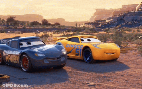 Lightning Mcqueen And Rusteze Are Standing Next To Each Other In The Desert GIF