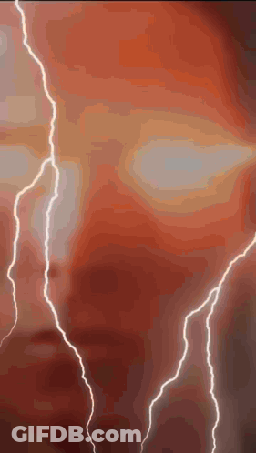 Lightning Strikes Against Red Background GIF