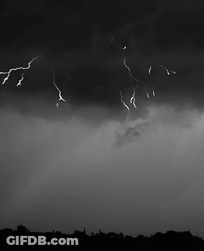Lightning Strikes Dark Cloudy Sky GIF
