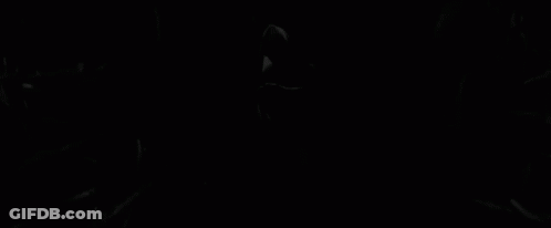 Lightning Strikes Over City At Night With Boat GIF