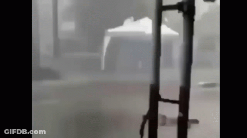 Lightning Strikes Over Ocean At Night GIF