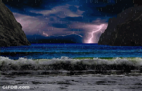 Lightning Strikes Over Ocean At Night GIF