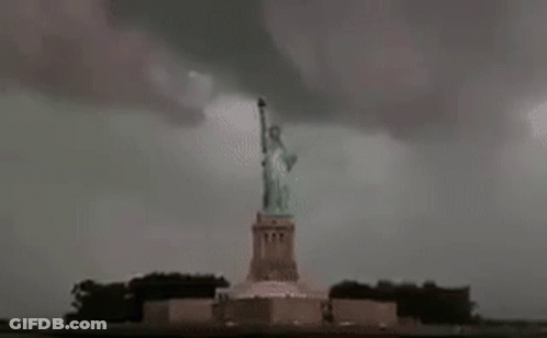 Lightning Strikes Statue Of Liberty During Storm GIF