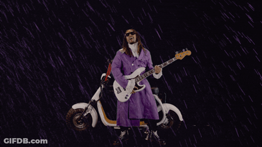 Lil Jon Playing Guitar While Raining GIF