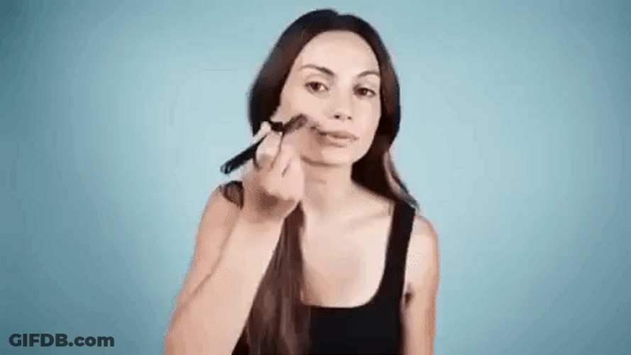 Lily Aldridge Brushes Cheek Mua GIF