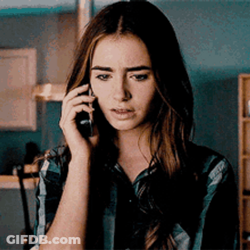 Lily Collins Getting Off A Call GIF