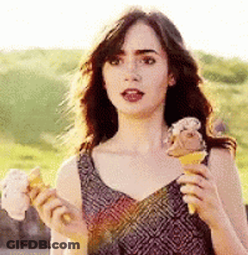 Lily Collins Holding Two Ice Creams GIF