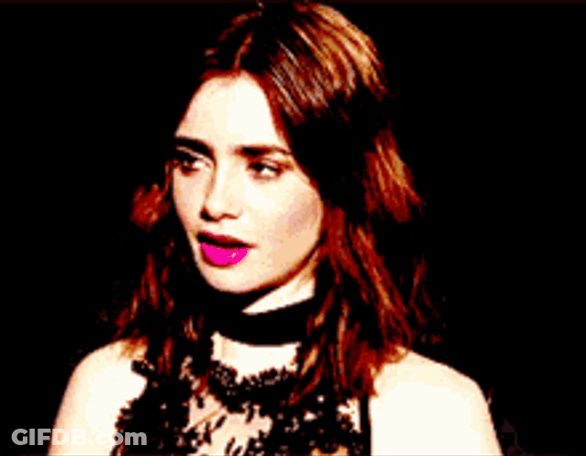 Lily Collins Sighing And Smiling GIF