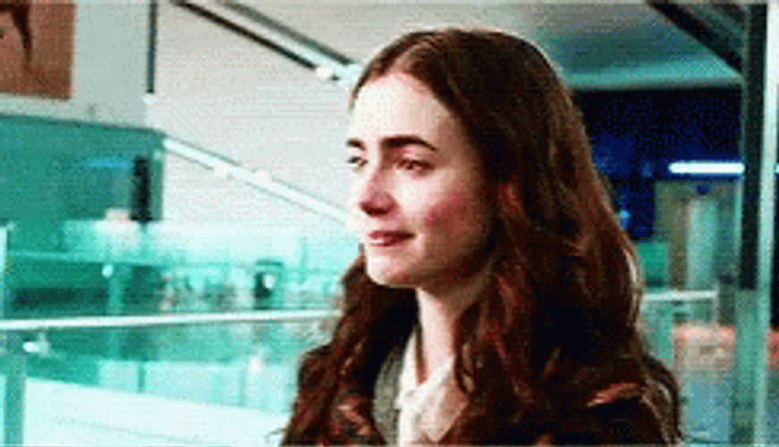 Lily Collins Smiling Softly GIF