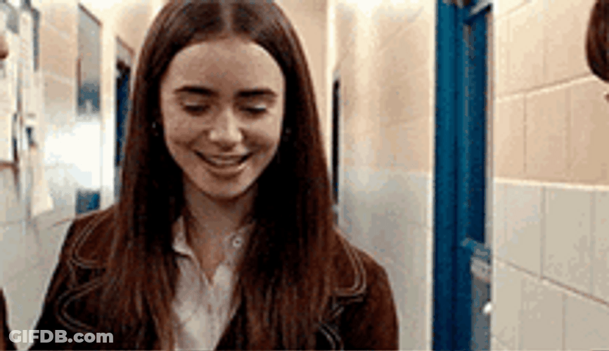 Lily Collins Smiling While Speaking GIF