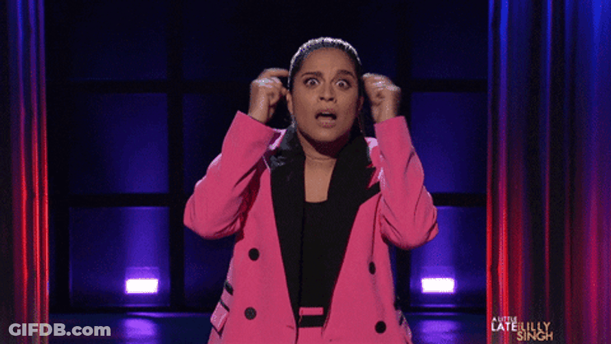 Lily Singh Pointing Fingers On Her Head Duhhh GIF