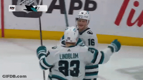Lindblom #23 Hugging Hockey Player On Ice GIF