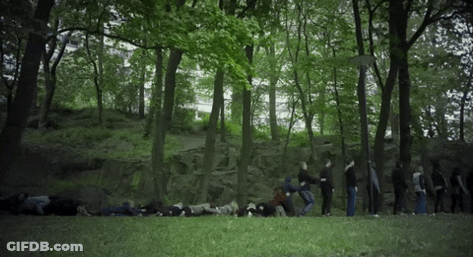 Lining People Like Dominos Falling GIF