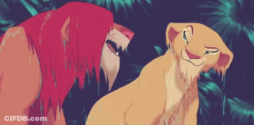 Lion And Lioness Smiling In Rain GIF