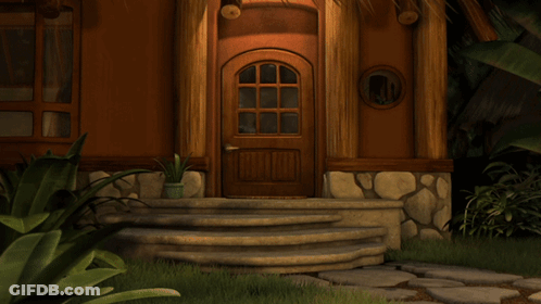 Lion Laying On Back In Front Of House GIF