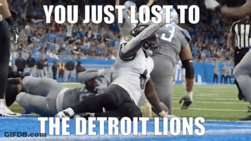 Lion Mascot In Blue Shirt And White Shorts GIF