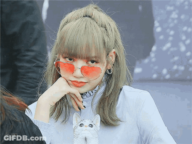 Lisa Of Blackpink Playfully Winks To Camera GIF