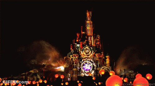 Lit Castle At Night With Text GIF