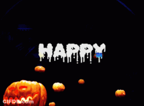 Lit Pumpkin In Front Of Happy Sign GIF