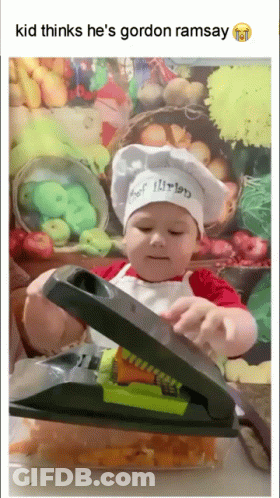 Little Boy Chef Cutting Vegetables GIF