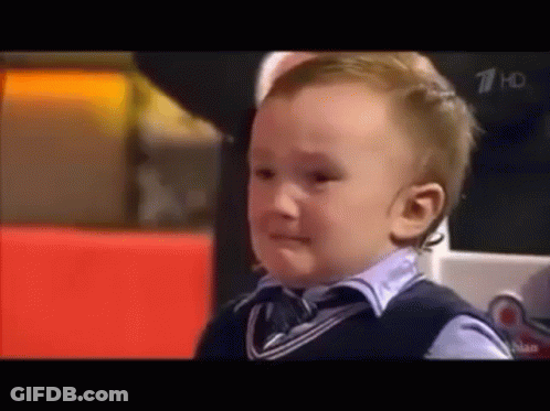 Little Boy Crying In A Chair GIF
