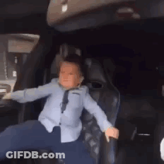 Little Boy Dancing In Back Seat Of Car GIF