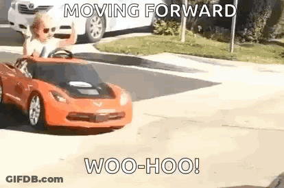 Little Boy Driving Red Toy Car GIF