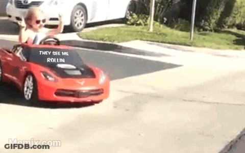 Little Boy Driving Red Toy Car GIF