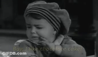 Little Boy Eating Chocolate Cake Saying Boy I Like Chocolate Cake GIF