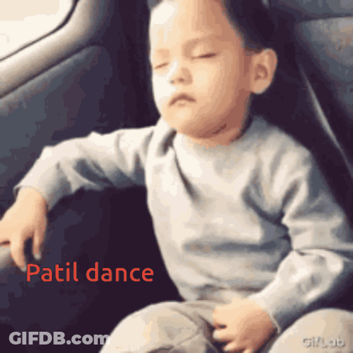 Little Boy In Back Seat With Patil Dance In Red GIF