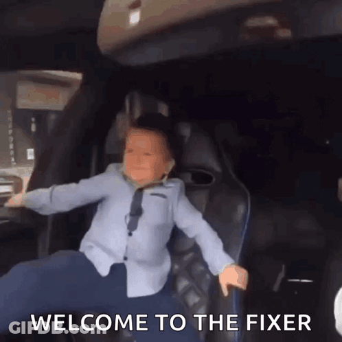 Little Boy In Back Seat With Welcome To The Fixer GIF