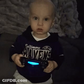 Little Boy In Baltimore Ravens Shirt Holding Video Game Controller GIF