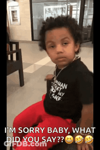 Little Boy In Black Shirt Saying I'm Sorry Baby What Did You Say GIF