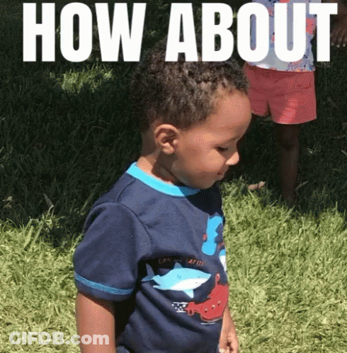 Little Boy In Blue Shirt With 3 In Grass GIF