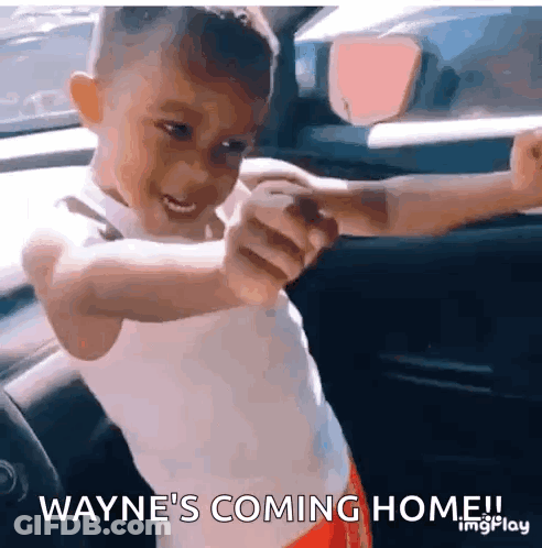 Little Boy In Car Saying Waynes Coming Home GIF