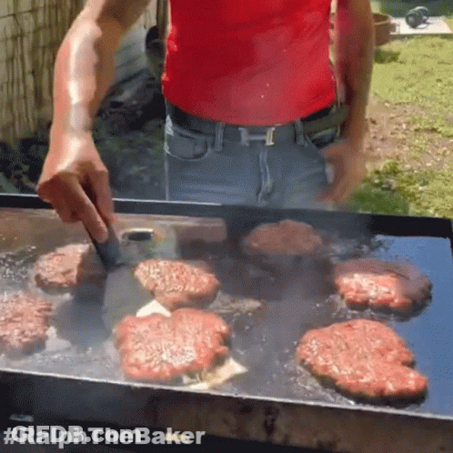 Little Boy In Chef Hat And Apron Saying BBQ GIF