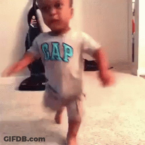 Little Boy In Gap Shirt Walking GIF