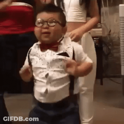 Little Boy In Glasses And Suspenders Dancing GIF
