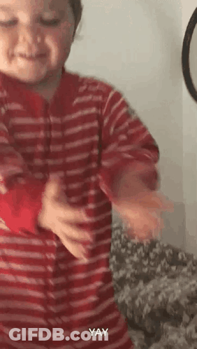 Little Boy In Red And White Striped Shirt Dancing Smiling GIF