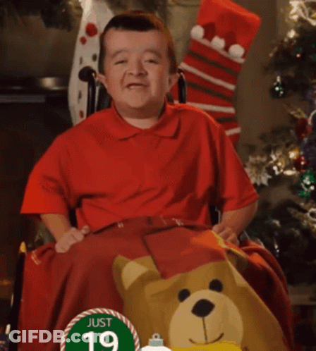 Little Boy In Wheelchair With Sign Saying Just 19 GIF