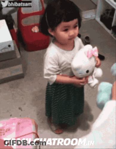 Little Boy Kneeling Holding Soap Dispenser GIF