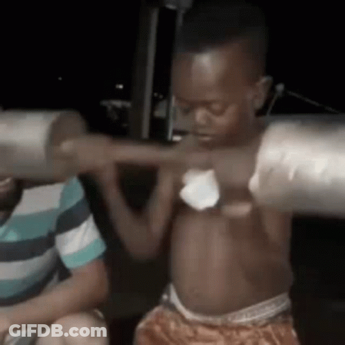 Little Boy Lifting Barbell Overhead GIF