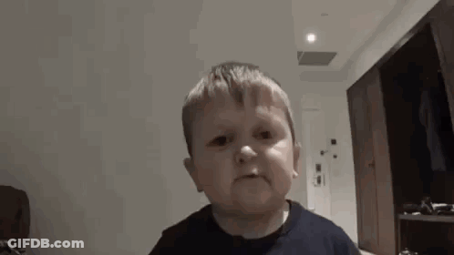Little Boy Making Funny Face GIF