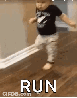 Little Boy Running On Wooden Floor GIF